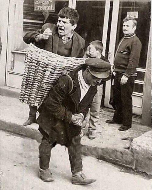 “The Drunk Basket.” In the 1960s, bars in Istanbul would hire someone to carry drunk people back to their homes.https://painted-face.com/