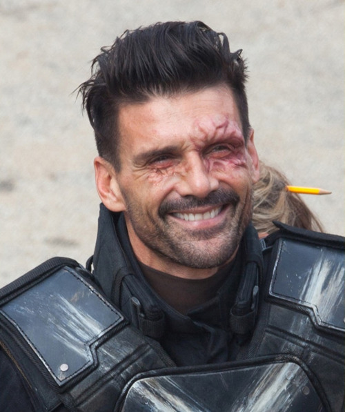 kingdomdaily:  Frank Grillo waves to the photographers while walking around set between takes of Captain America: Civil War on Monday morning (May 18) in Atlanta, Ga.The 49-year-old actor took off his mask and showed off some special effects scarring