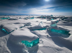 obonic:  stories-yet-to-be-written:  EpicDash: 32 Surreal Places On Earth That Belong In A Dream, Part 2.  Part 1 here 1: Turquoise Ice, Lake Baikal, Russia. Lake Baikal is the largest and oldest freshwater lake in the world. In the winter, the lake