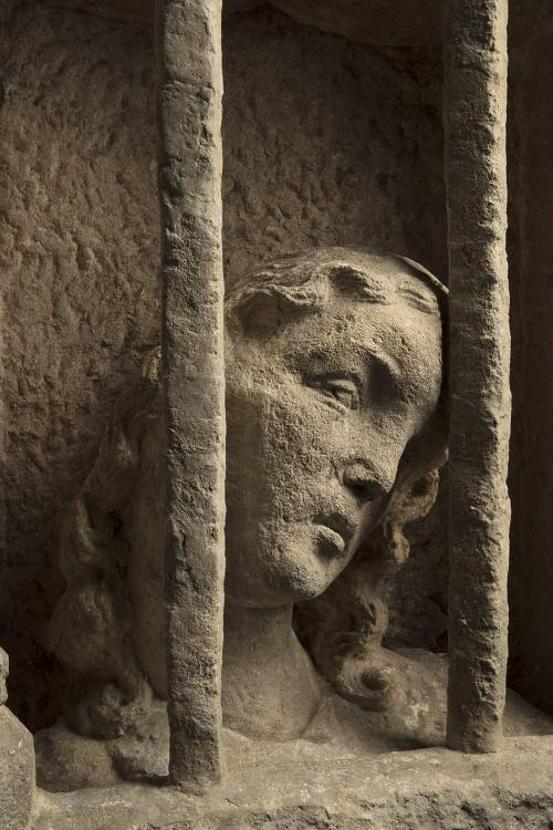 redlipstickresurrected: Saint Avia (The Jailed Woman) +detail, c. 1500, Sculptures: Limestone with t