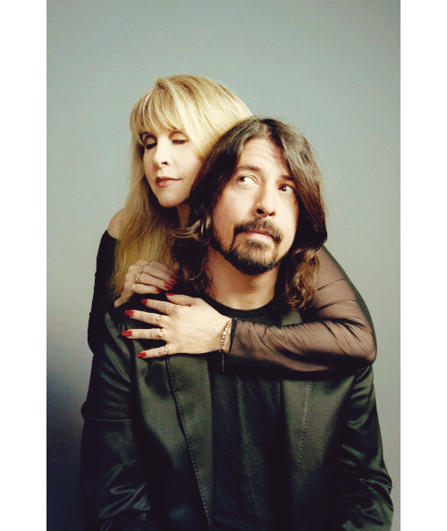 crystalline-:  “Grohl arrives first, dressed in a long sleeve, blue and black plaid button-down with faded blue jeans and black Doc Martens. Nicks arrives a short while later, again in black, and retreats to freshen up before the photo shoot. When