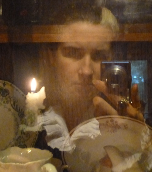 I tried to take some selfies in the China cabinet window.
