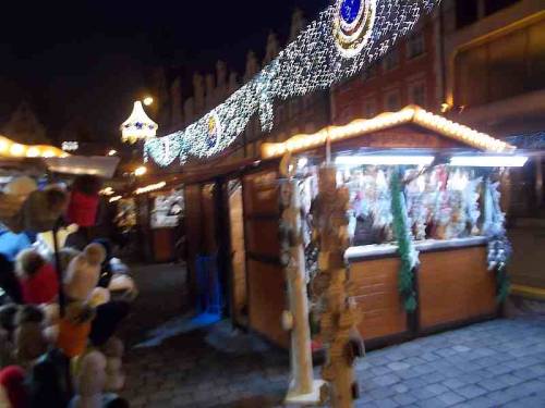 Small stores of vendors with merchandise offered during Christmas market 2021 in the city Wroclaw, P