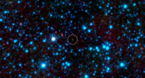 sixpenceee:  Scientists from NASA have discovered star-like bodies with temperatures cooler than the human body. The coldest brown dwarf known so far, is denoted by a green dot in very center of this infrared image. The chilly star-like body isn’t even