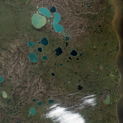 Pothole lakes in northern Siberia (Russia).As the glaciers retreated during the last Ice Age, some l