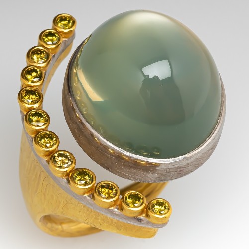 vysjewelry:Moonstone, green diamond, gold, and platinum ring, Peter Schmid for Zobel Atelier (at Era