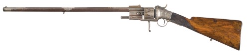 Engraved and gold decorated percussion revolving rifle crafted by Cogswell of London, mid 19th centu