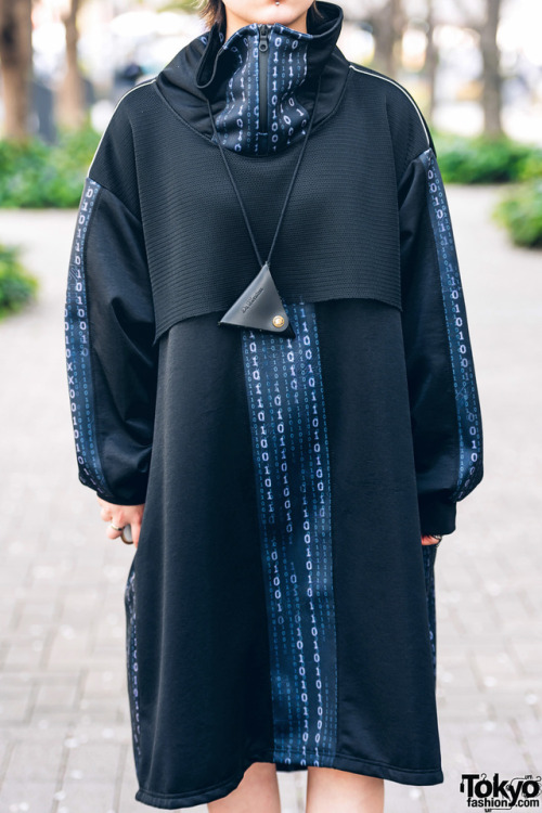 19-year-old Rino’s minimalist futuristic street style in Tokyo with a binary code print cowl n