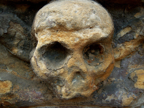 Skulls &amp; skeletons on grave markers in various centrally located Scottish cemeteries.