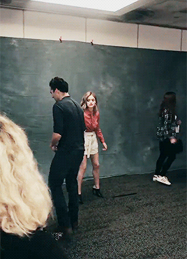 ianmharding:Lucy pulling Ian into place for their photoshoot ❤