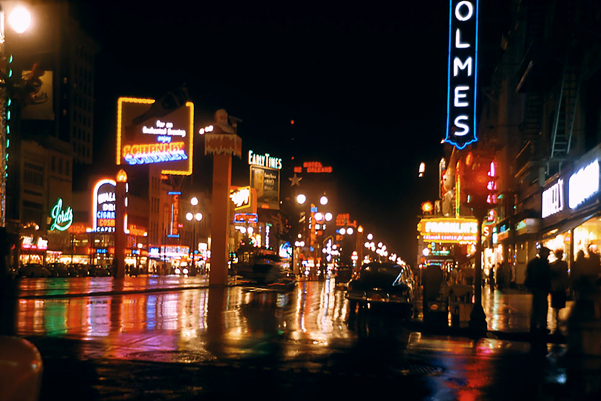 20th-century-man:  Looking up Canal St. from Bourbon St., New Orleans / photo by