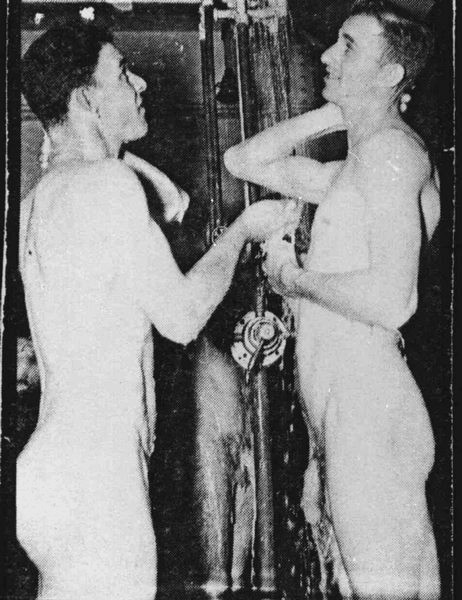 vintagemusclemen:  Two GIs sharing a shower in close quarters with some interesting