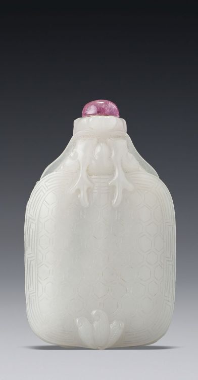 A white jade &lsquo;Turtle Dragon&rsquo; snuff bottleQing Dynasty, 18-19th century.