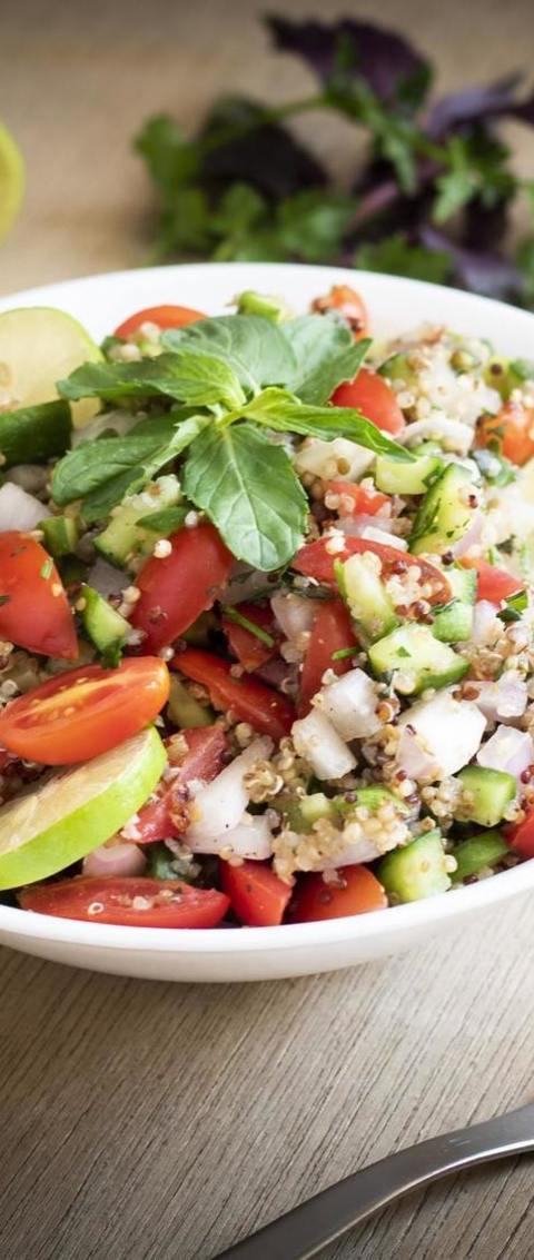 Quinoa Salad With Red Onions, Grape Tomatoes, Limes, And Cucumber
