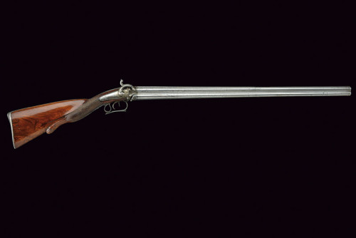 A four barreled percussion shotgun originating from France, mid 19th century.