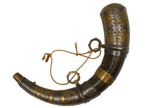 Brass and silver mounted gunpowder horn, North Africa, 19th century.from Helios Auctions