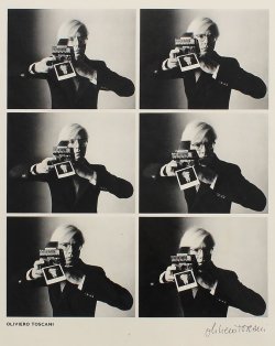 Andy Warhol with Polaroid camera - Ph. Oliviero