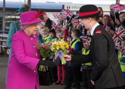 Queen Elizabeth II arrives at Plymouth Railway Station as she visits the city on March 20, 2015 in P
