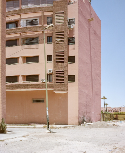 from What happens when nothing happens  other than the weather, people, cars and clouds, Morocc