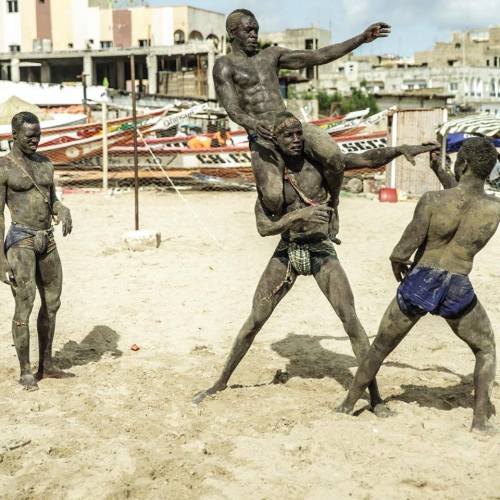 immigrantslenz:  Senegal’s Pride by   Ndumiso Omowale Sibanda   Wrestling is a big sport in Senegal. The well built men get involved in this sport for reasons including bragging rights and also continuing a family tradition. they are aided by all kinds