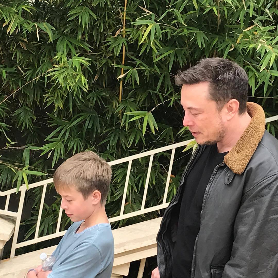 Elon Musk fans. — Elon musk with one of his kids.