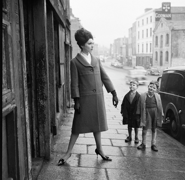 A girl can never have too many admirers! by National Library of Ireland on The Commons on Flickr.