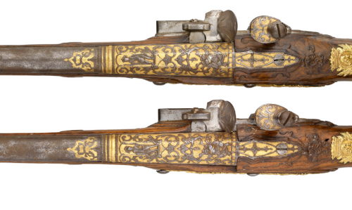 Gold decorated flintlock pistol originating from Liege, Belgium.  Crafted by Phllippe Desellier