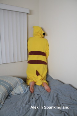 Me, in a Pikachu onesie, in the corner. 