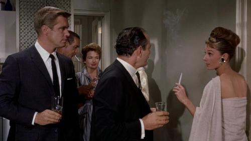 gatabella:  Audrey Hepburn, Breakfast At Tiffany’s, 1961It’s a bed sheet you see her wearing at her cocktail party. A scene was cut from the film in which Holly is taking a bath and has to improvise a gown on the spot. One more example that Audrey