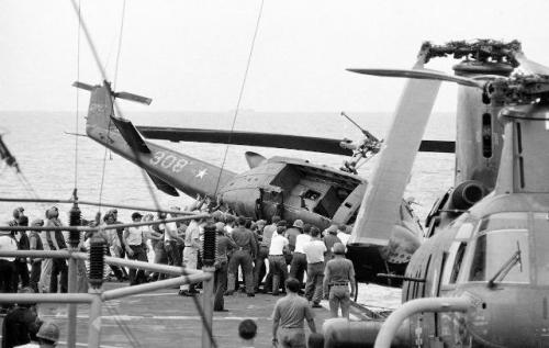 XXX historicaltimes: Soldiers push a helicopter photo