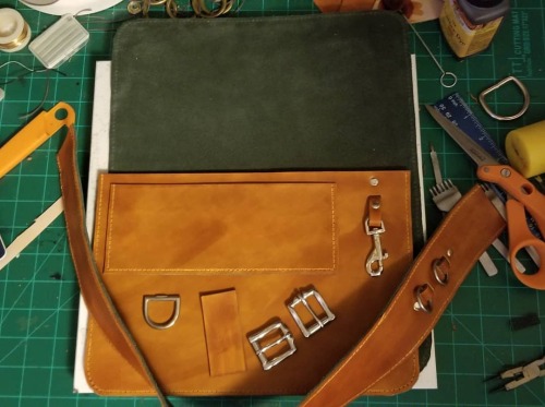 An update on the project. Got the leather dyed and green suede liner attached to it. A few other thi