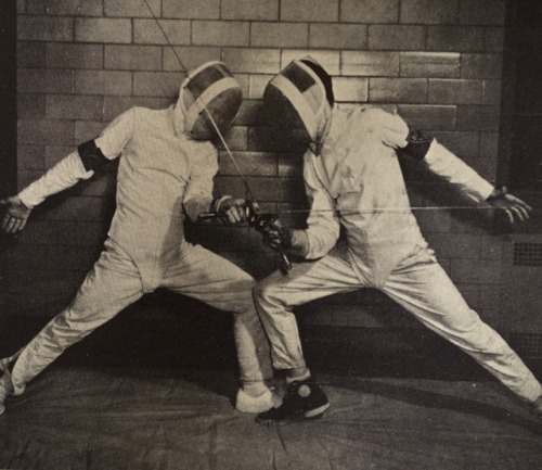 modernfencing:[ID: two foilists hitting guard to guard.]University at Buffalo fencers in 1955!