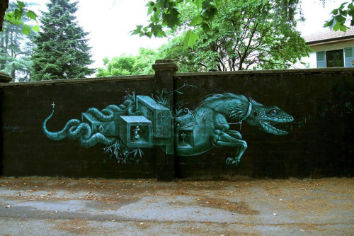 crossconnectmag:  Street art by Kraser  Spanish street artist, Kraser Tres, dresses our walls with bizarre tales, using a post-surrealistic language which can talk to everyone. Coming from Cartagena, his art tells absorbing stories. He distorts childish