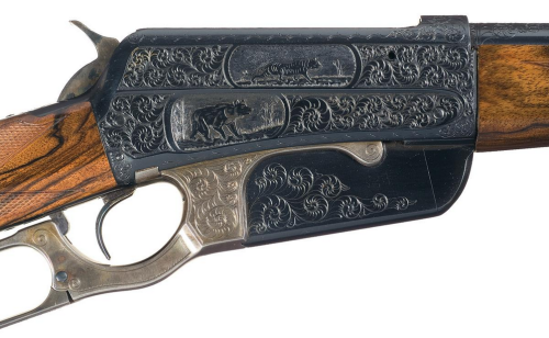 A lovely custom engraved Winchester Model 1895 with Circassian walnut stock.  Produced in 1905.