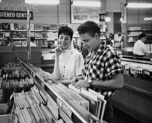 theniftyfifties:  Eddie Cochran goes record shopping. 