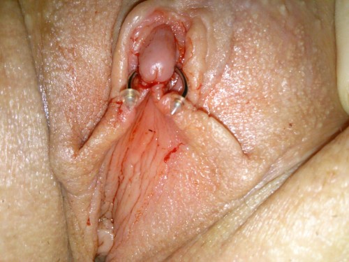  pussymodsgalore The original poster says:“Pierced my own clit… Hahaha im nuts lololol ignore the blood though its just from doing the piercing”. The pics on the left are the clearest, the centre one being the best. After the piercing a