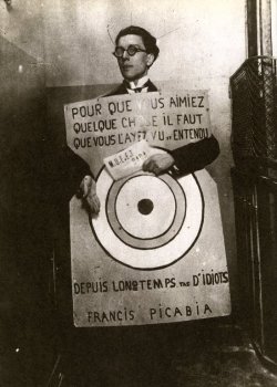  Francis Picabia - André Breton at the Dada Festival Wearing a Target (designed by Francis Picabia for his theatre production “Festival manifeste presbyte”)photography - March 27, 1920 