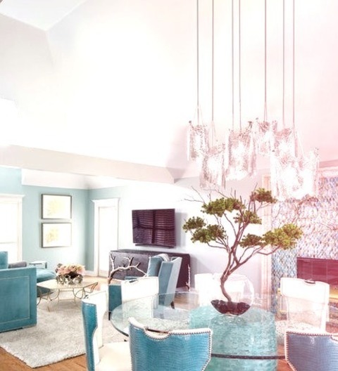 Dining Room - Tropical Dining RoomExample Of A Mid-sized Island Style Medium Tone Wood Floor And Brown