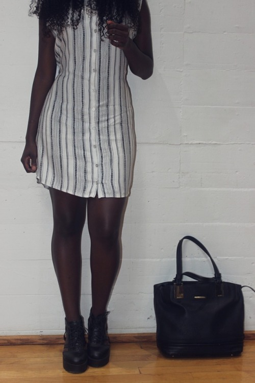 Midnight Skin on white with black stripes.With the African touch of a Susen Leather Collection handb