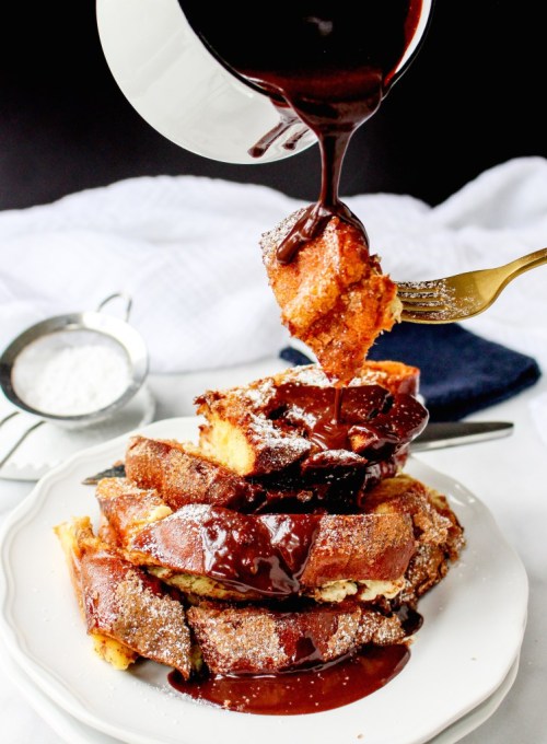 sweetoothgirl:  Churro French Toast Casserole with Mexican Chocolate Drizzle  