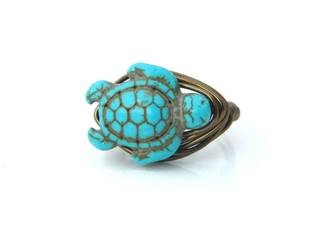wickedclothes:  Turquoise Turtle Ring Crafted out of turquoise, this turtle is attached