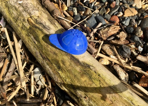Small plastic baseball cap.