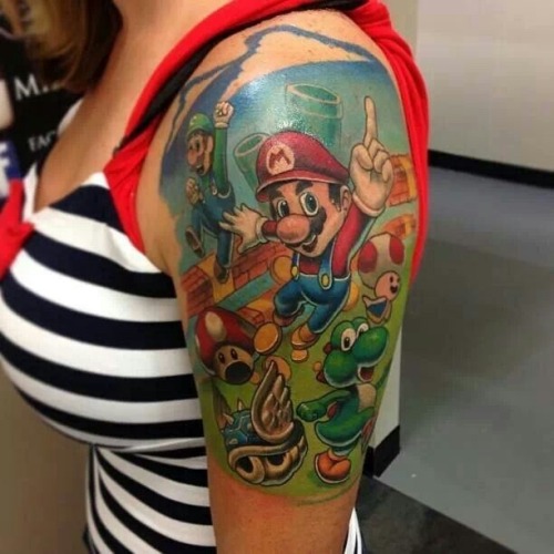 isquirtmilkfrommyeye:  Some amazing Nintendo Tattoos by some amazing artists.