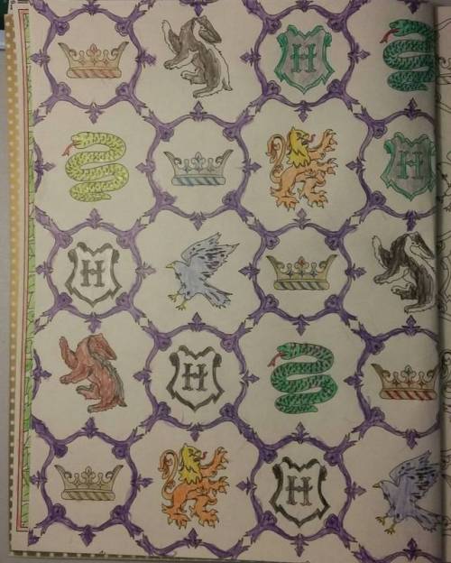 The finished page of a collage of Harry Potter symbols that I finished in my, “Harry Potter” colorin