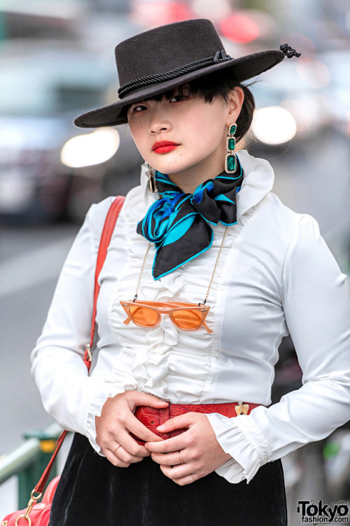 Japanese high school students Mawoni, Rumpa, and Miori on the street in Harajuku wearing a mix of vi