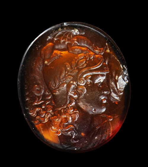 archaicwonder: Roman Glass Ringstone with Athena, 1st Century AD She is wearing a helmet decorated w