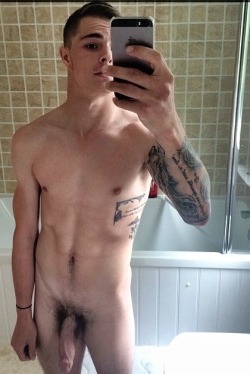 imahornyaussie:  I’d like to feel that!  http://guystricked.com/tattoo-guy-tight-uncut-dick/