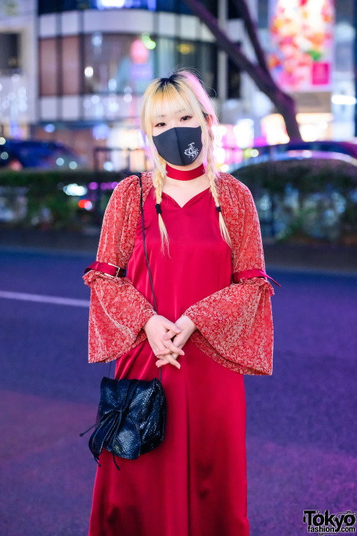 20-year-old Japanese fashion designer Nana Miyashita wearing a buckle-and-flare sleeve dress by her 