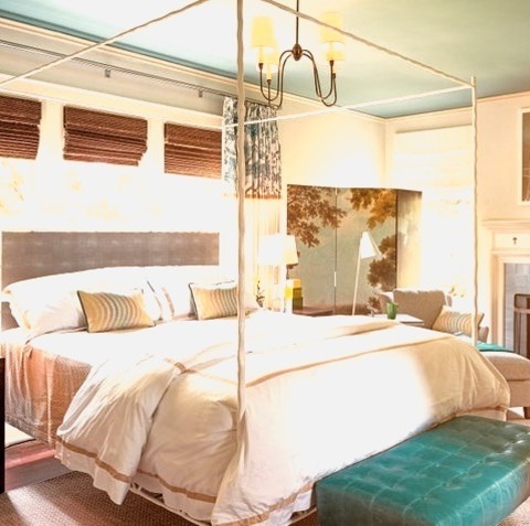 Transitional BedroomBedroom - Large Transitional Master Bedroom Idea With White Walls, A Tile Fireplace,
