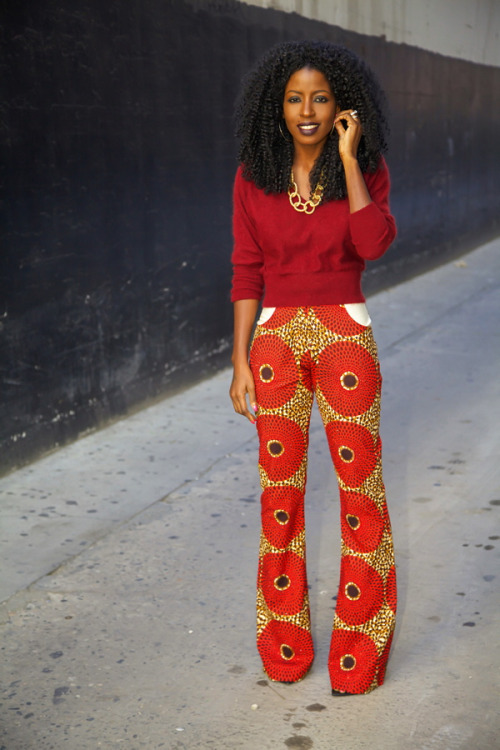 itsloudinsidemyhead:Dolman Sleeve Sweater + African Print TrousersPants; Sunny Rose | Necklace; avai